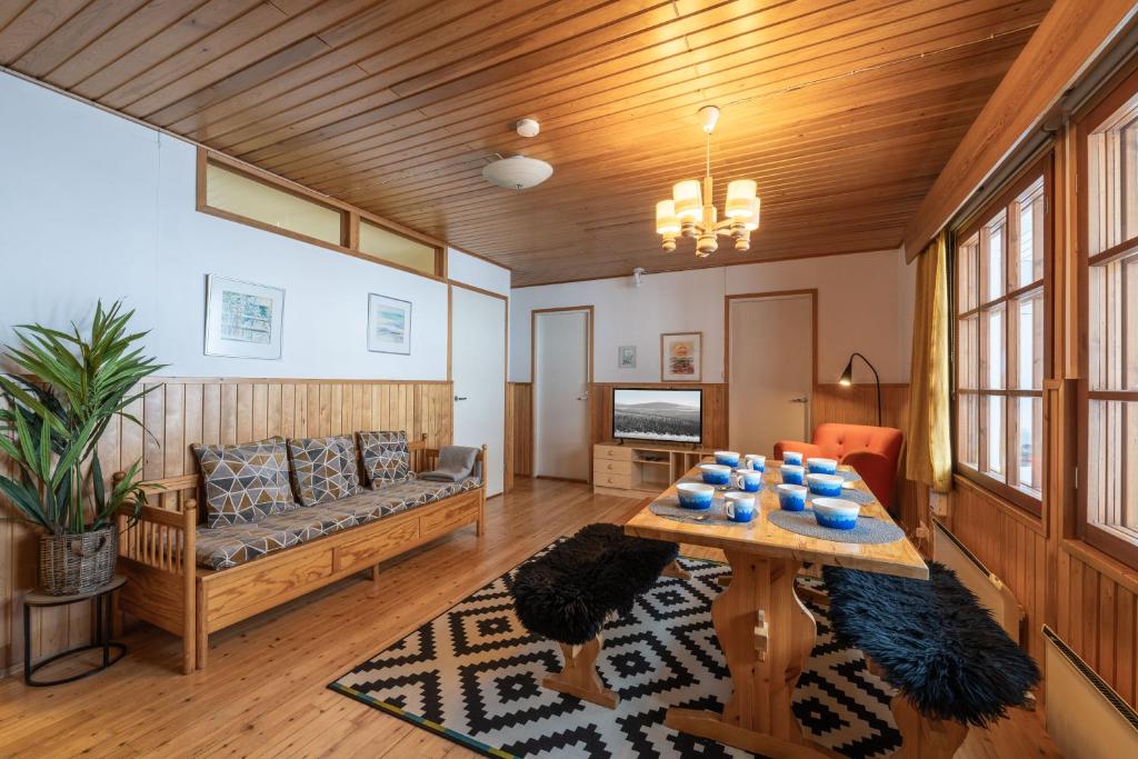 Гостиная зона в Kuukkeli Apartments Saarisatu ja Urupää