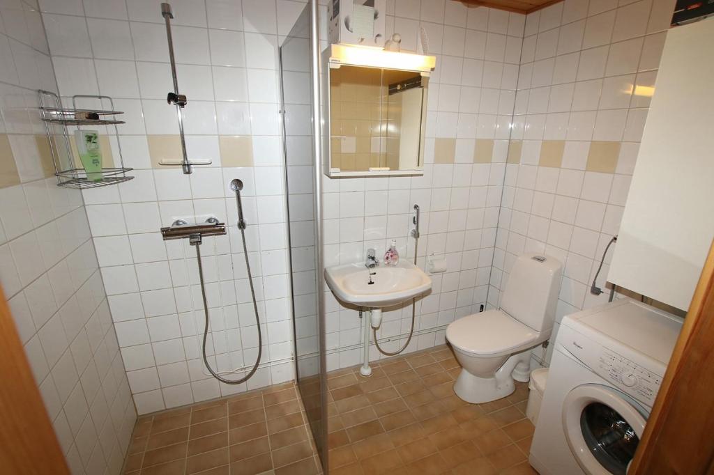 Ванная комната в Kuukkeli Apartments Saarisatu ja Urupää