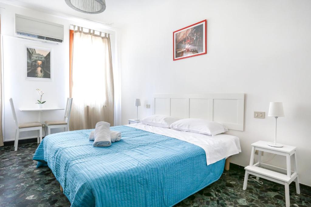 Posteľ alebo postele v izbe v ubytovaní Inlaguna