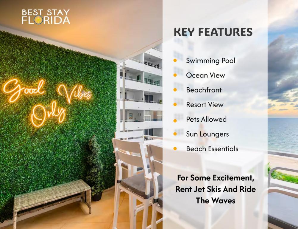 a sign for a restaurant with a green wall at Beach Front Condo, Sea View, Beach Access, Balcony in Fort Lauderdale