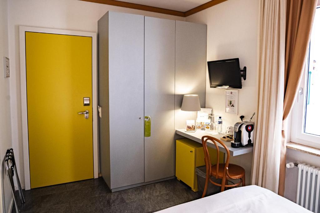 Voodi või voodid majutusasutuse Albergo Carcani by Ketty & Tommy toas