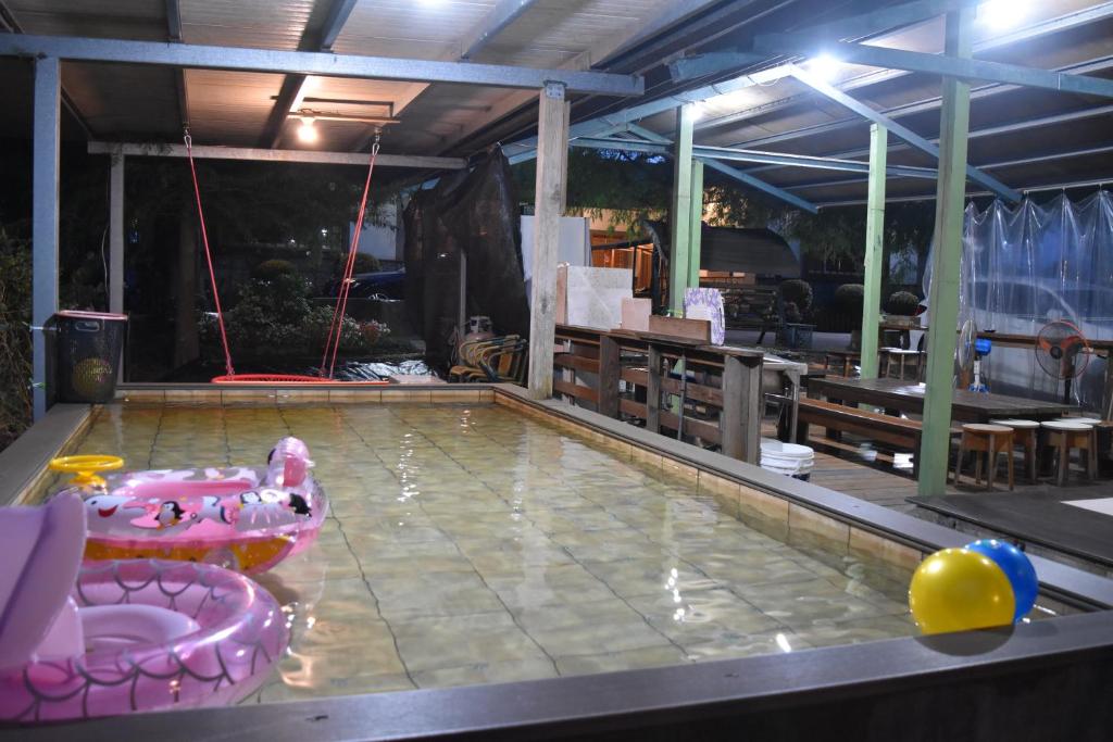 Bazén v ubytování 鄉間雅築休閒民宿Country Villa Homestay nebo v jeho okolí