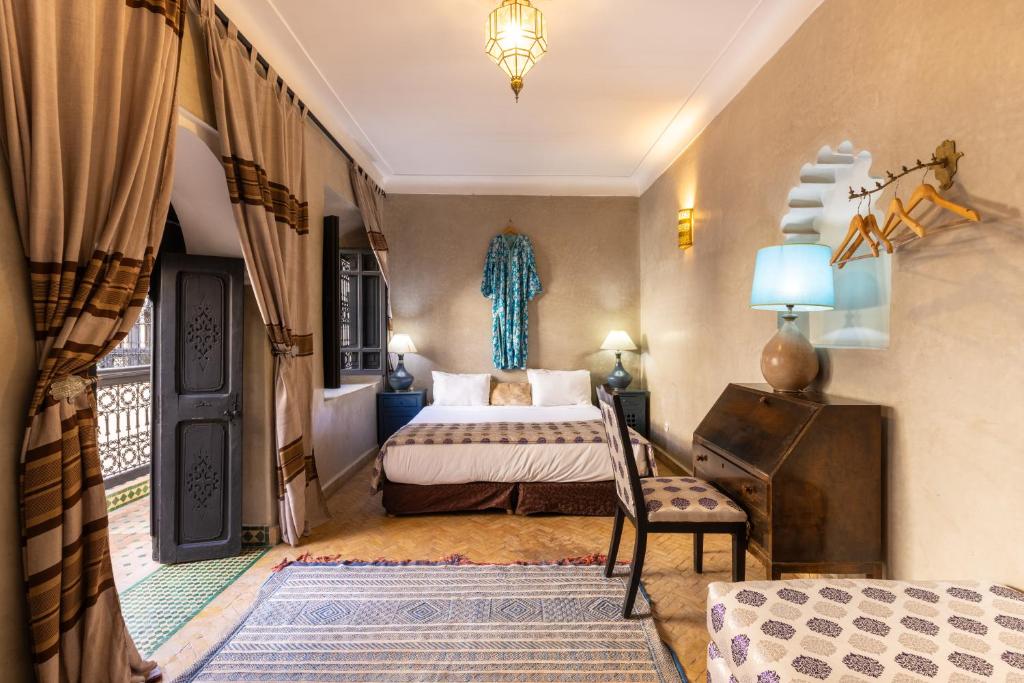 Postel nebo postele na pokoji v ubytování Riad Saba