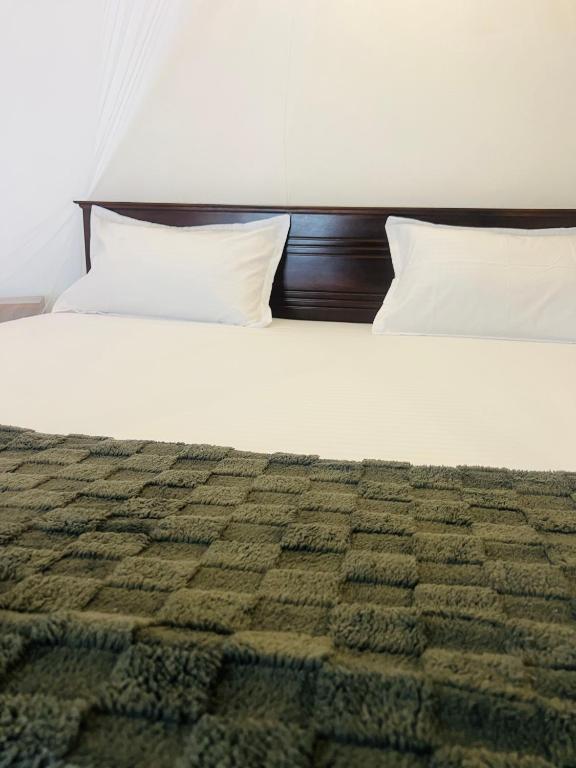 Postel nebo postele na pokoji v ubytování Bloom Bay