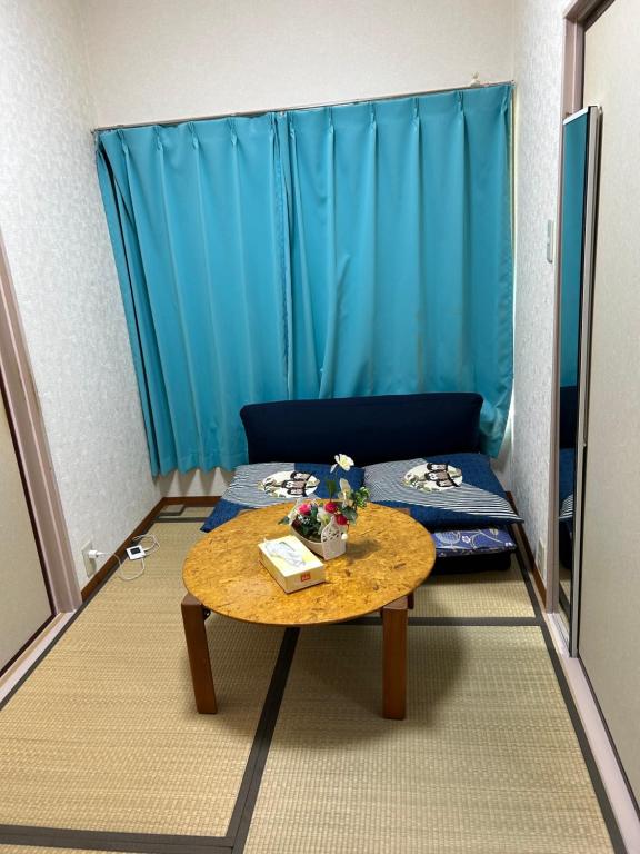 Ein Sitzbereich in der Unterkunft ハイツドリーム梦想小屋