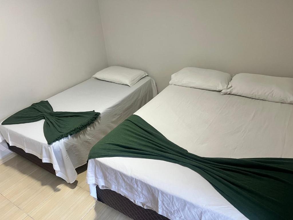 Postel nebo postele na pokoji v ubytování Brisas di mar