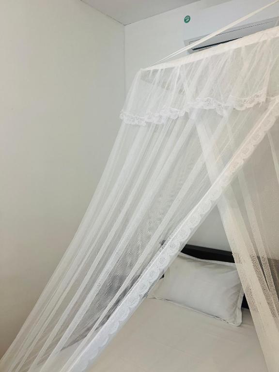 Postel nebo postele na pokoji v ubytování Bloom Bay