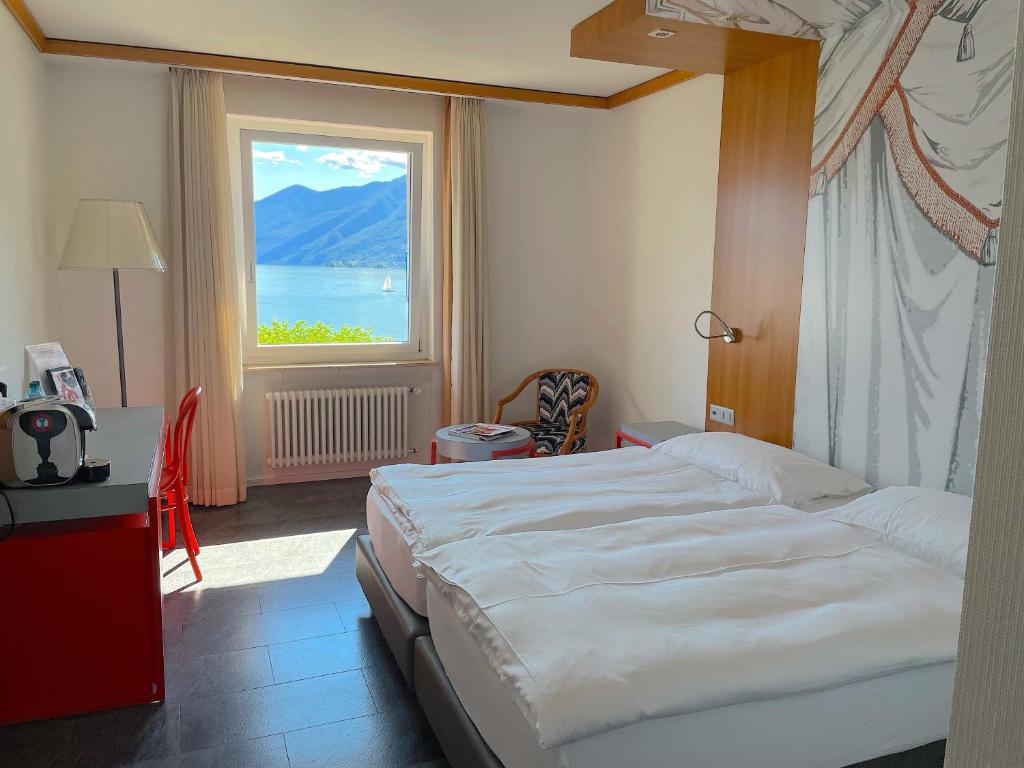 Voodi või voodid majutusasutuse Albergo Carcani by Ketty & Tommy toas