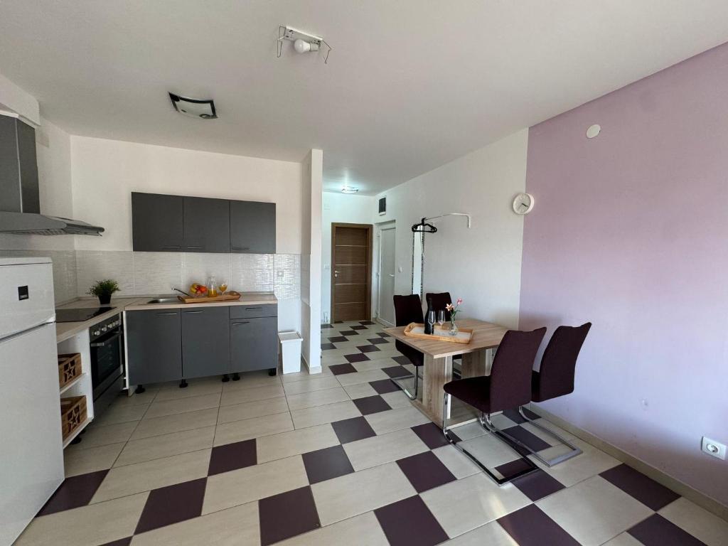 Kuchyň nebo kuchyňský kout v ubytování Apartmani "Bodulo"