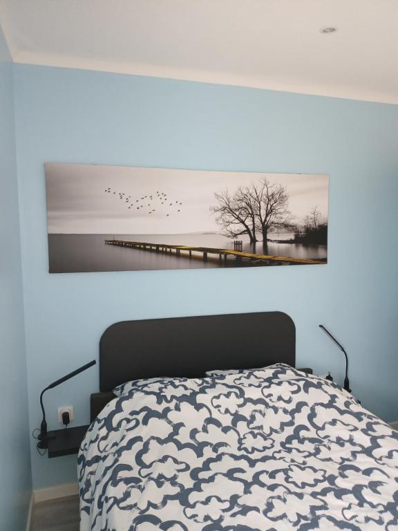 Posteľ alebo postele v izbe v ubytovaní Au Tromp l'oeil Studio ou T2