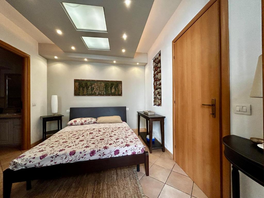 A bed or beds in a room at Appartamento G&G
