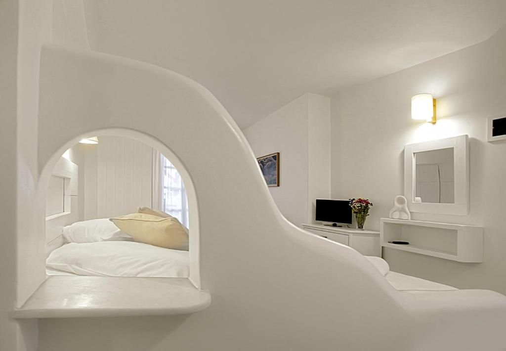 Uma cama ou camas num quarto em Glaros Studios