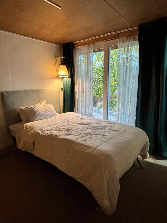 Postel nebo postele na pokoji v ubytování Casa Balmaceda Backpackers