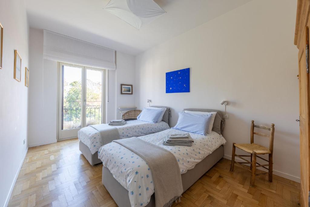 Postel nebo postele na pokoji v ubytování Blue Dream