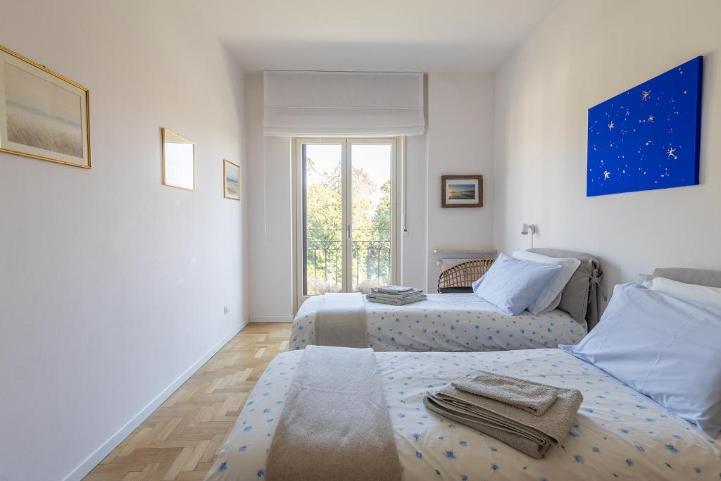 Postel nebo postele na pokoji v ubytování Blue Dream