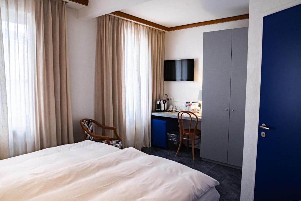 Voodi või voodid majutusasutuse Albergo Carcani by Ketty & Tommy toas