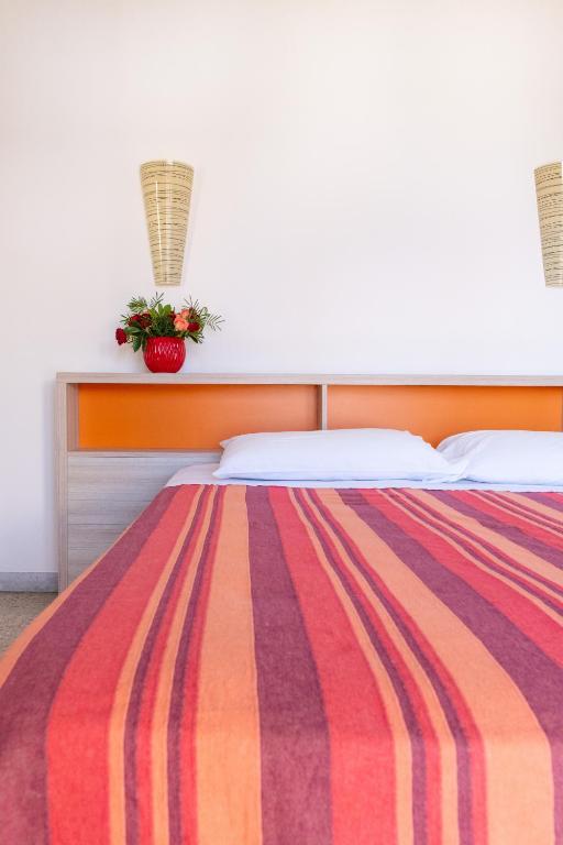 Postel nebo postele na pokoji v ubytování Hotel Silver