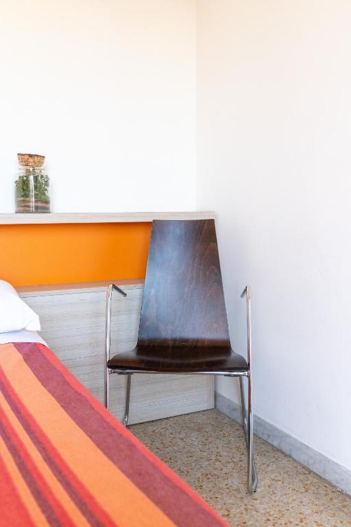 Postel nebo postele na pokoji v ubytování Hotel Silver