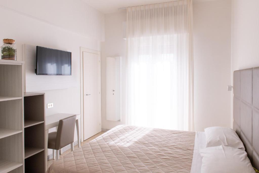TV a/nebo společenská místnost v ubytování Hotel Silver