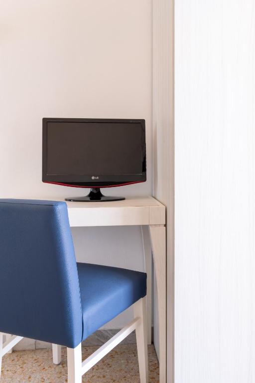 TV a/nebo společenská místnost v ubytování Hotel Silver