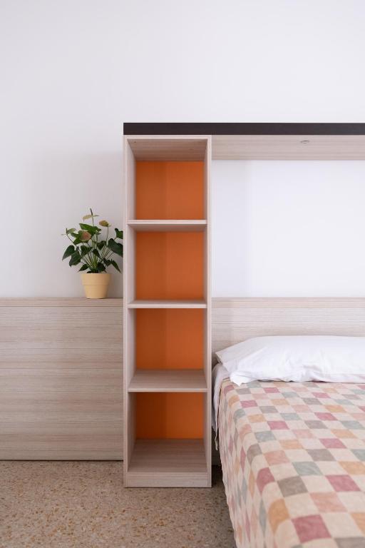 Postel nebo postele na pokoji v ubytování Hotel Silver