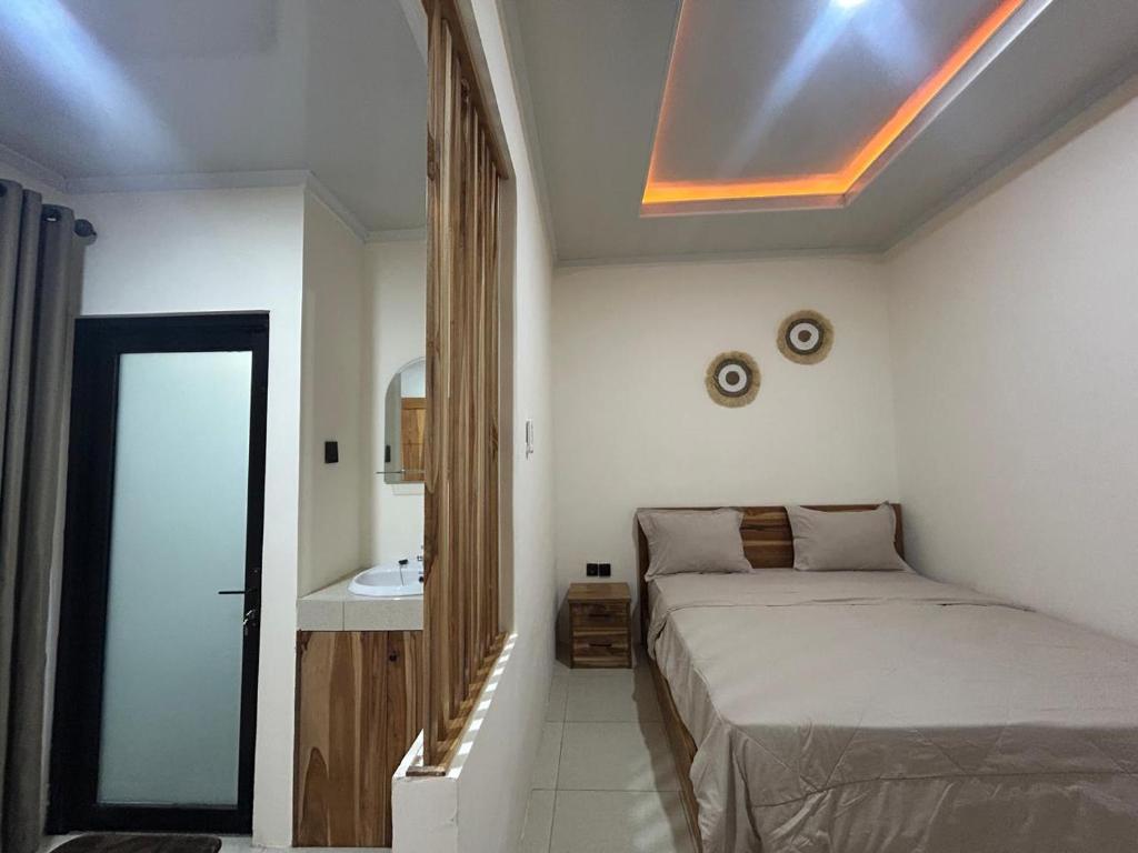 Postel nebo postele na pokoji v ubytování Sukha homestay