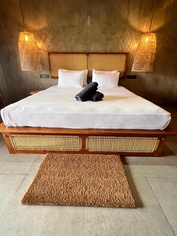 Postel nebo postele na pokoji v ubytování Roy's Villa