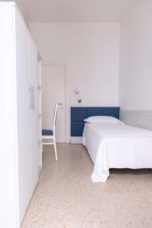 Postel nebo postele na pokoji v ubytování Hotel Silver