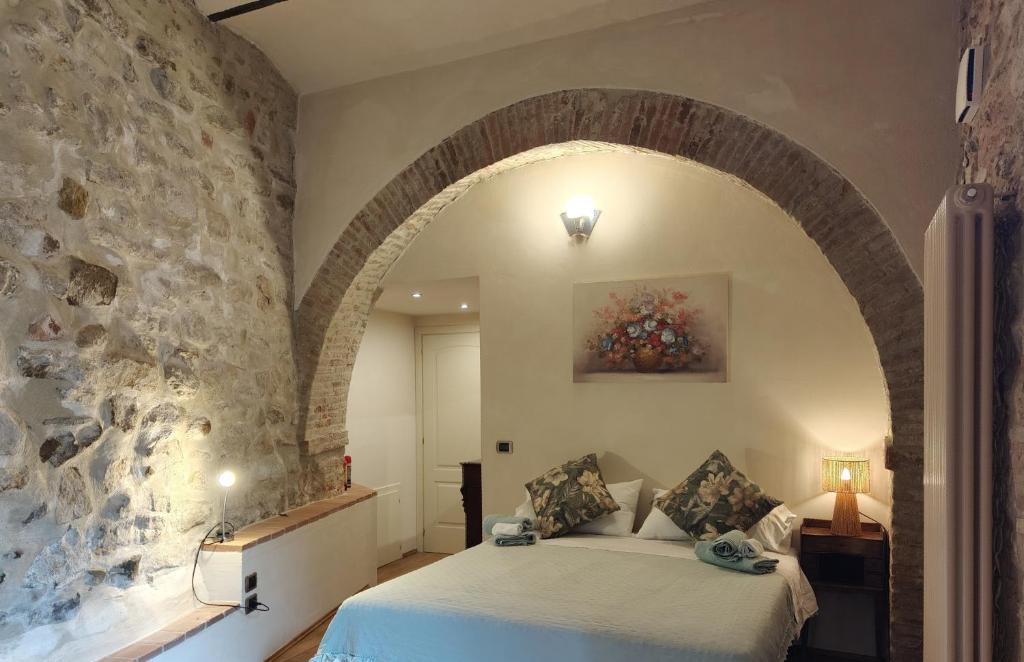 Postel nebo postele na pokoji v ubytování "Il Pollaio" guests house