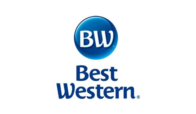a blue btu logo with the text best western at SureStay Studio by Best Western Gonzales in Gonzales