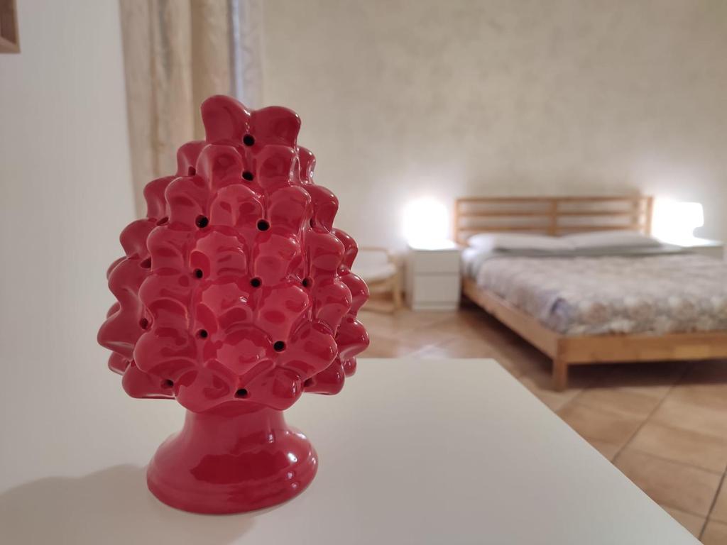 A bed or beds in a room at Appartamento Aci Sant'Antonio