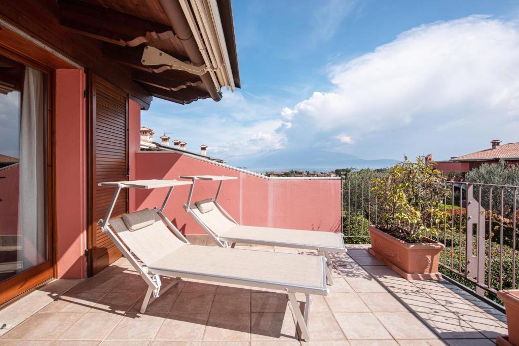 Balkón nebo terasa v ubytování La Terrazza sul Lago - Splendida Vista sul Garda