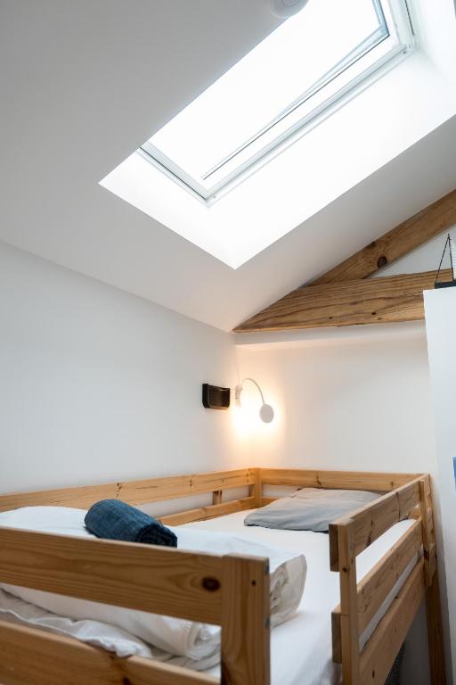 Postel nebo postele na pokoji v ubytování Ted Surf House
