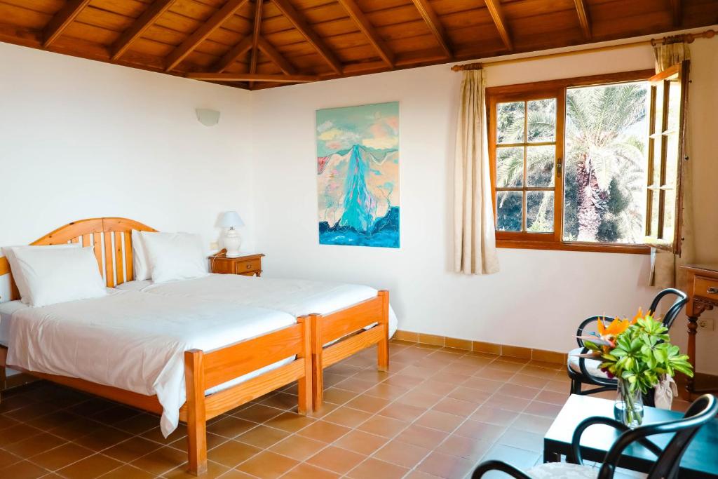 Postel nebo postele na pokoji v ubytování Casas-Bungalows Los Pajeros