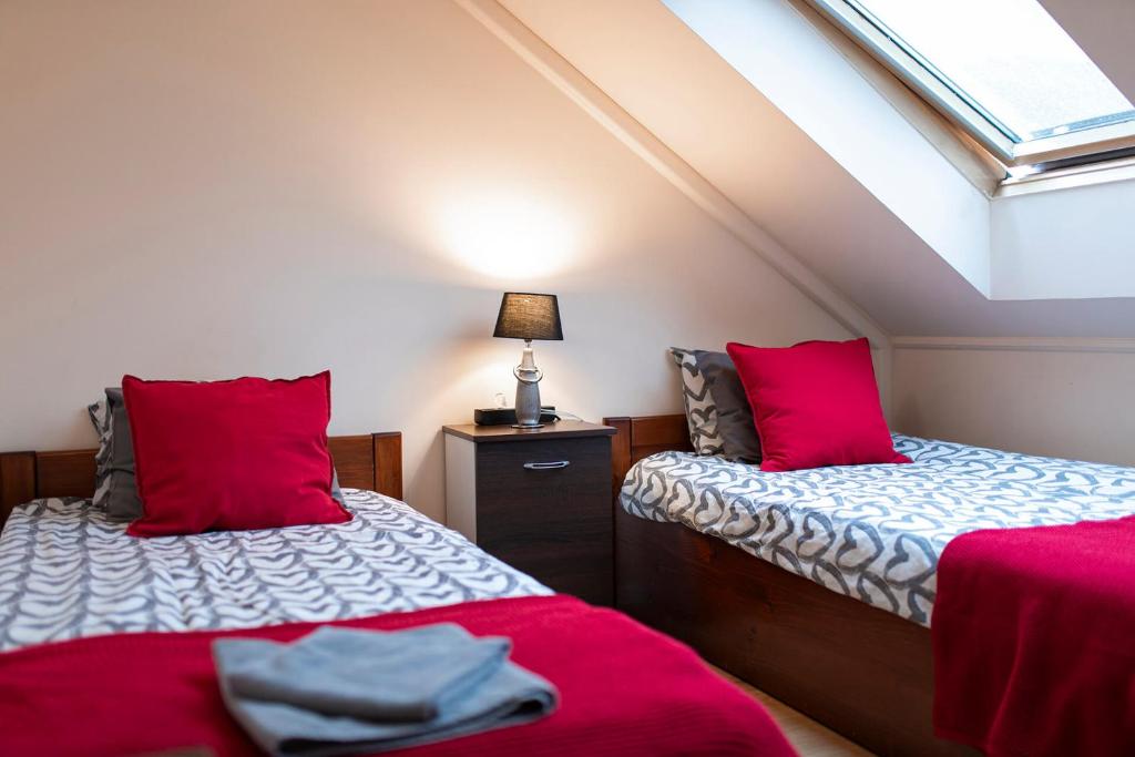 Letto o letti in una camera di Lucsony Apartman