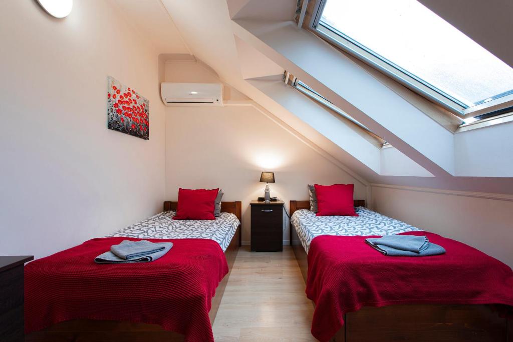 Letto o letti in una camera di Lucsony Apartman