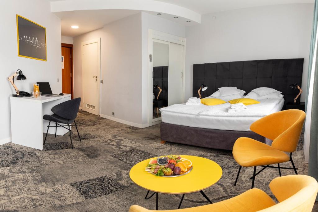 Posteľ alebo postele v izbe v ubytovaní Hotel Nafta Krosno
