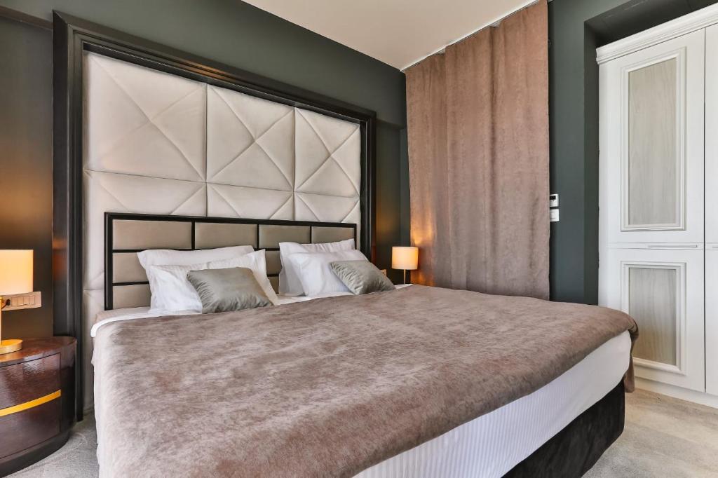 Postel nebo postele na pokoji v ubytování Maresia Boutique Suites