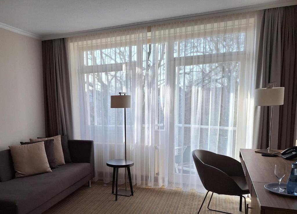 Posezení v ubytování Upstalsboom Parkhotel