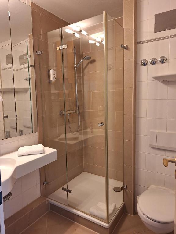 Koupelna v ubytování Upstalsboom Parkhotel
