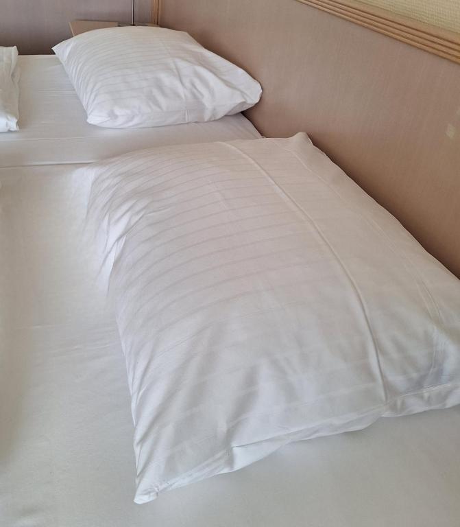 Postel nebo postele na pokoji v ubytování Upstalsboom Parkhotel
