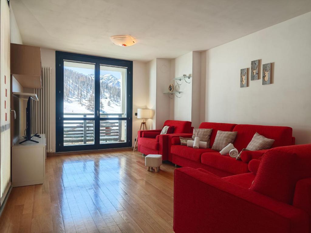 Posezení v ubytování Hostdomus - Sestriere Alpine Escape