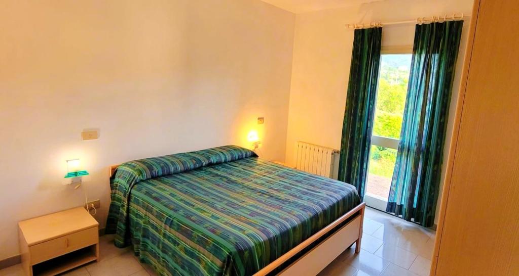 Postel nebo postele na pokoji v ubytování Residence Alithai