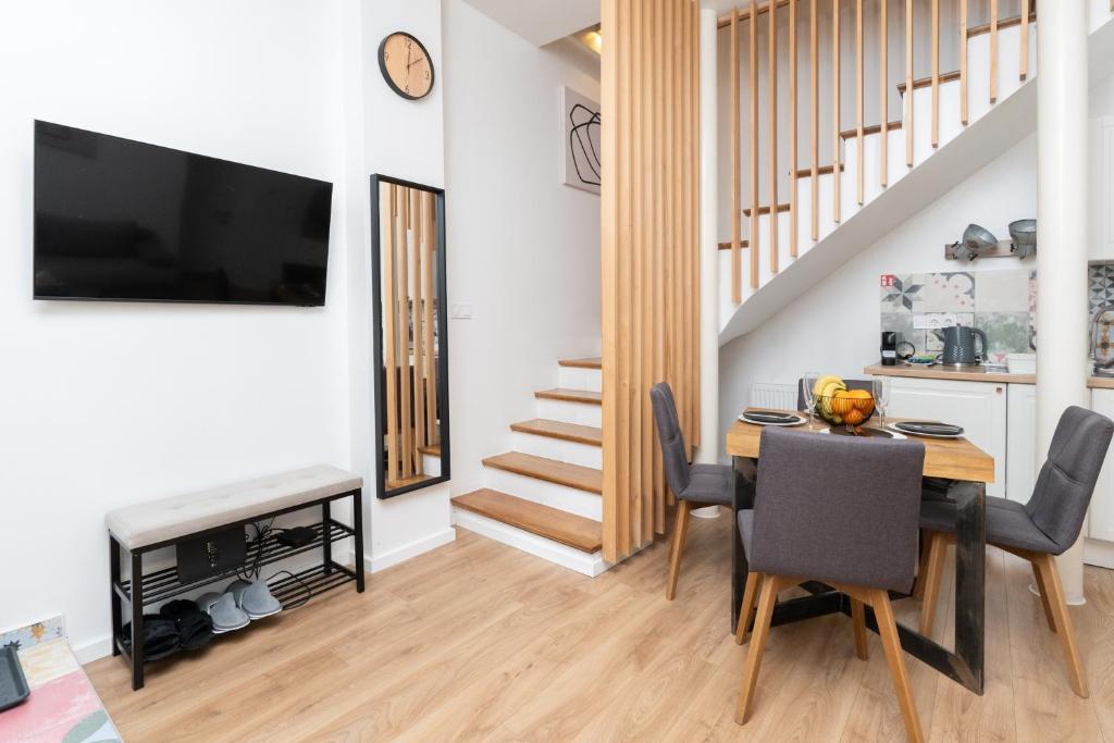 Televízia a/alebo spoločenská miestnosť v ubytovaní BY's home