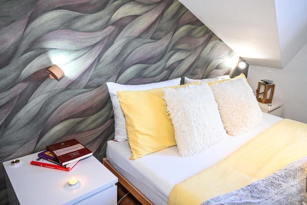Postel nebo postele na pokoji v ubytování A Casa di Lu' Elegant Rooms
