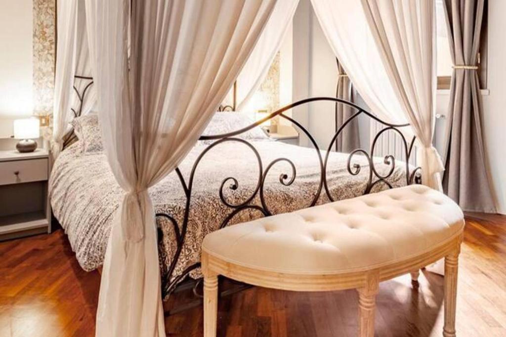 A bed or beds in a room at Design Villa with parking Navigli area Milan