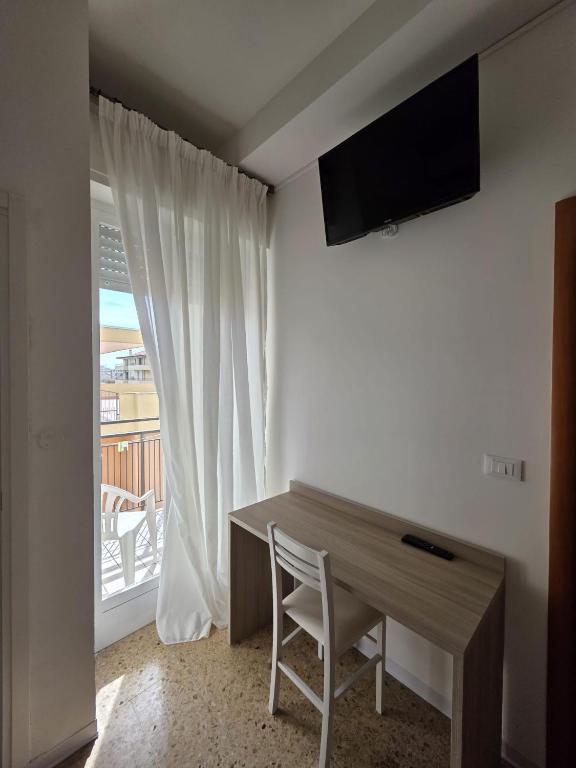 TV a/nebo společenská místnost v ubytování Villa Ella by Interlux