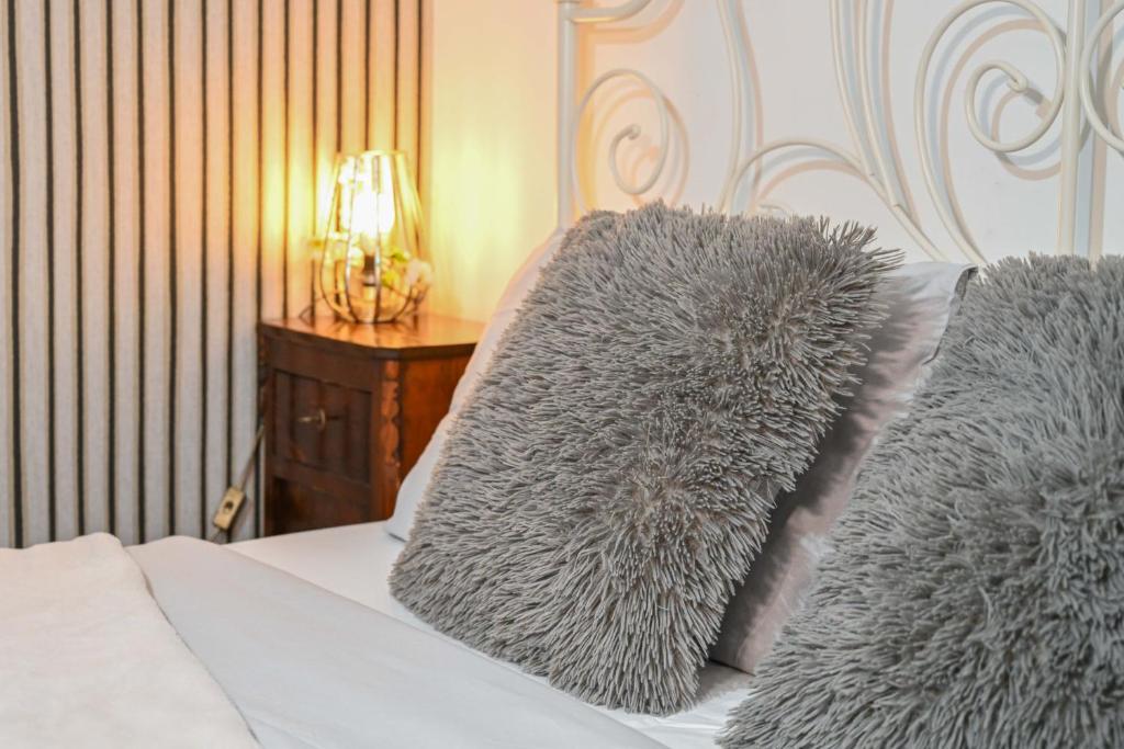 Postel nebo postele na pokoji v ubytování A Casa di Lu' Elegant Rooms