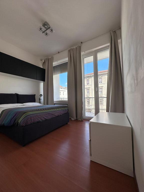 Postel nebo postele na pokoji v ubytování Piazza Salotto