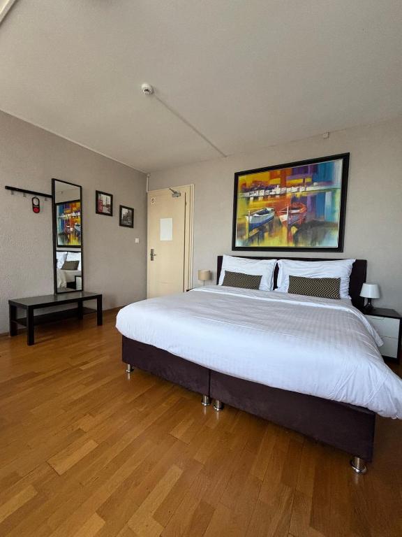 Uma cama ou camas num quarto em Hotel Parc & Lac
